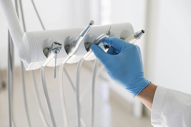 Professional Tooth Extraction technician working in Cleveland, OK
